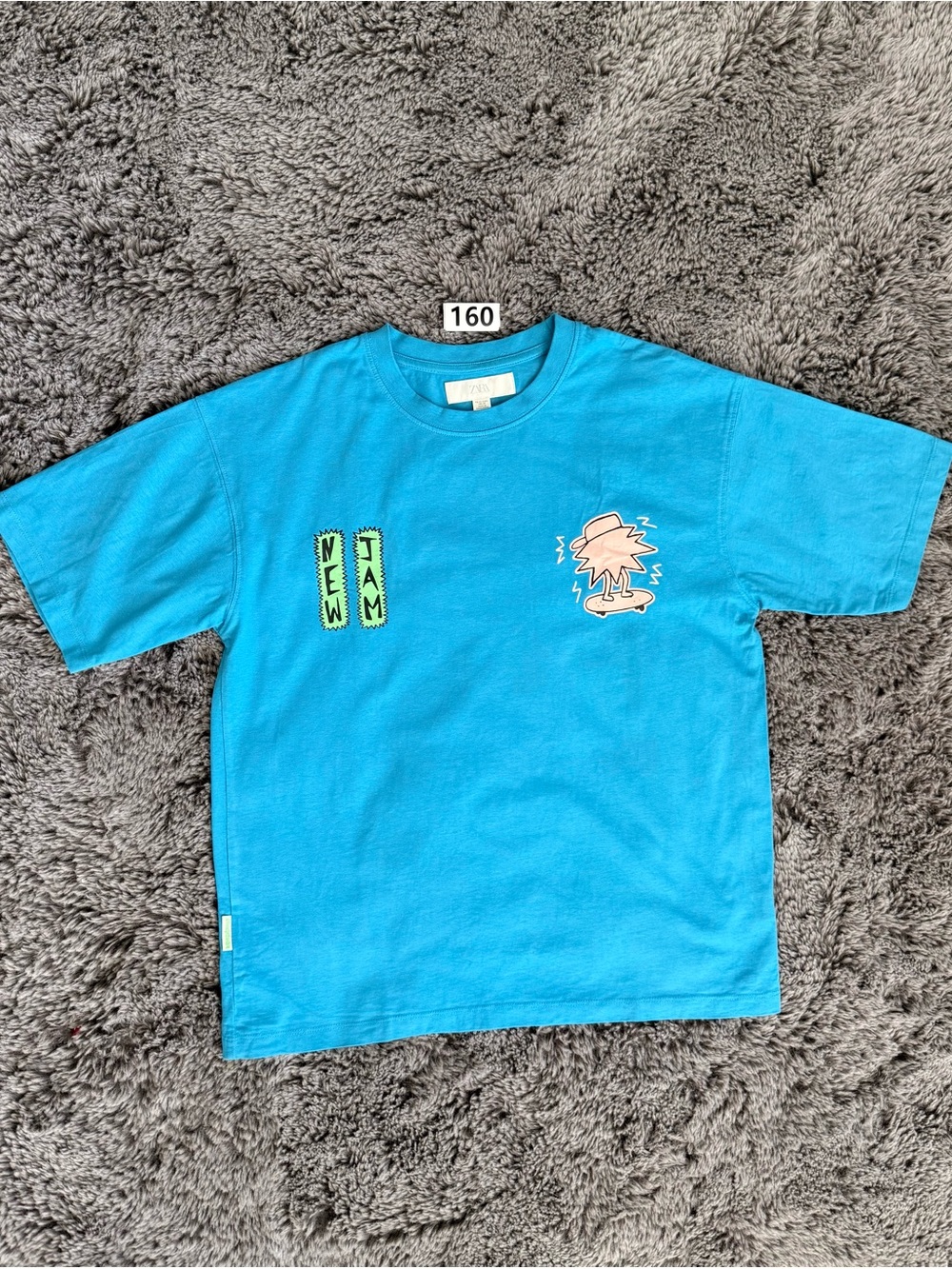 Zara Turquoise Short Sleeve Tee with Neon Green & Pink Graphics